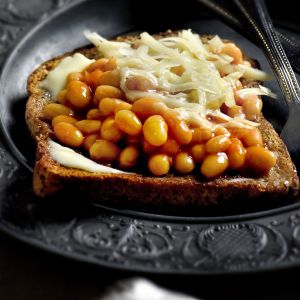 Tomato baked beans on wholegrain toast sprinkled with cheese