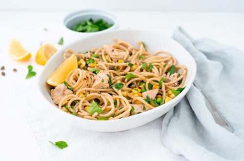 Tuna pasta in a bowl topped with parsley